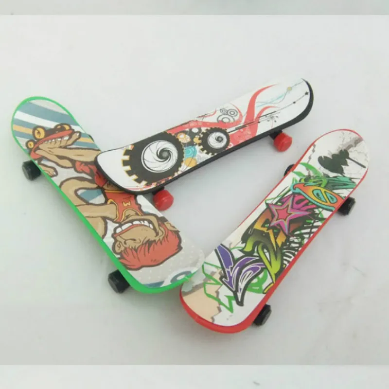 Buy 4pcs/set Plastic Mini Finger Skateboard Toy