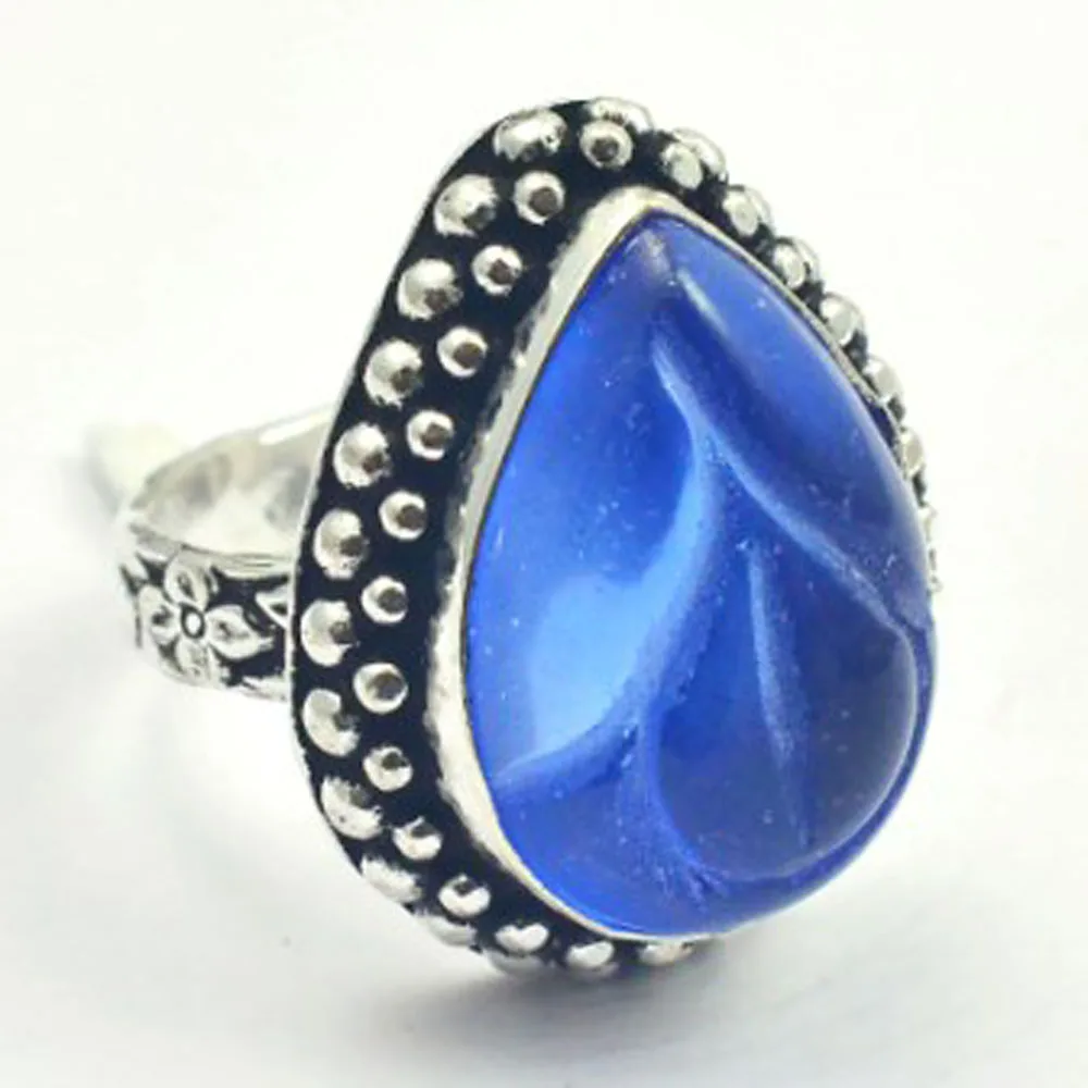 

Carved-Iolites Ring Silver Overlay over Copper , Size: 7.25, R4368