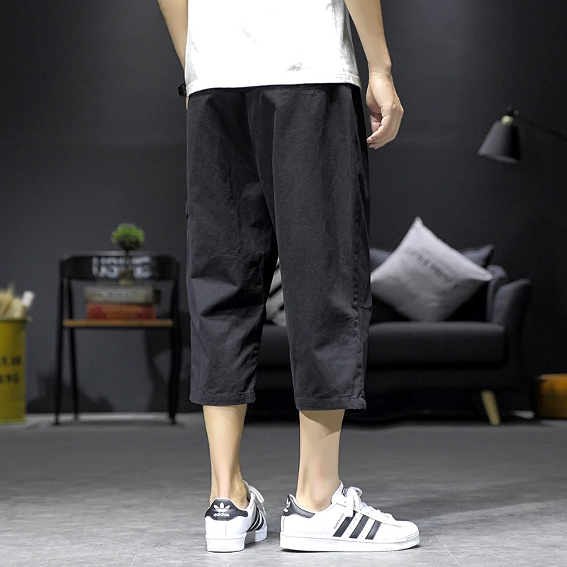 

Safari Style Calf-Length Pants Multi-Pockets Solid Color Men's Pants Elastic Waist Large Size Black Gray Calf-Length Pants