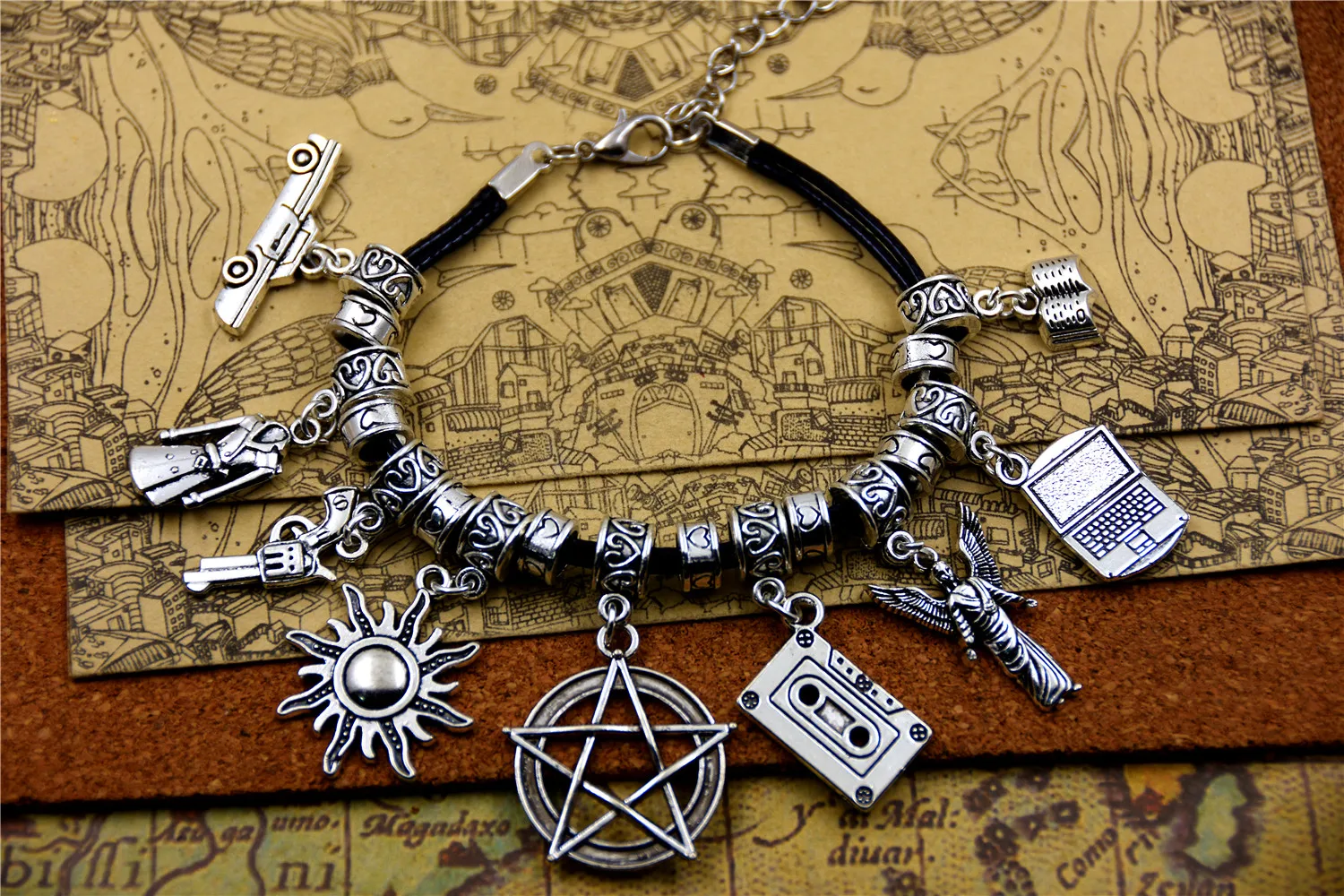 

TV series inspired supernatural leather charm bracelet car coat gun sun laptop book pendant bracelets