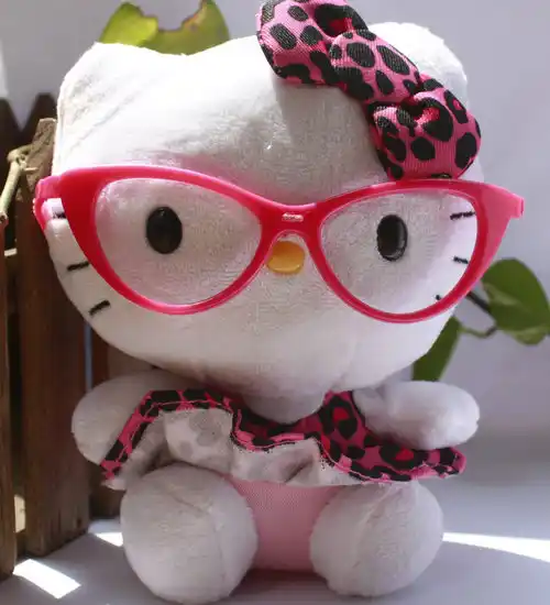 soft doll with glasses