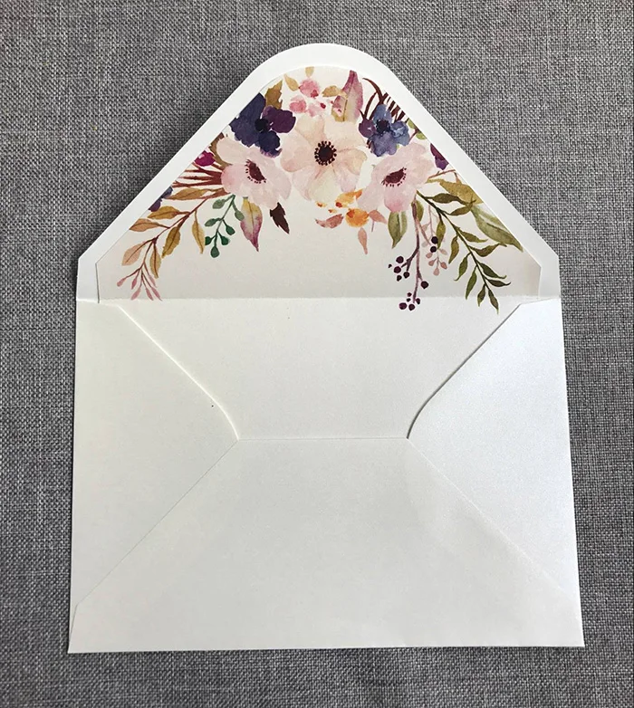 

custom pearlised paper envelope with floral liner 135x195mm