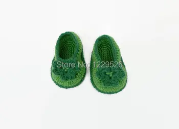 

Crochet baby booties Irish green Crochet shamrock First st patrick day Green crochet baby shoes St patricks Crochet clover