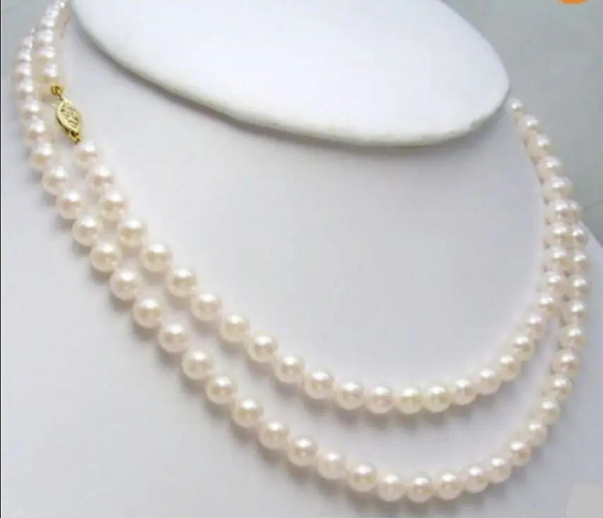 

7-8MM AA WHITE JAPANESE AKOYA PEARL NECKLACE 32"