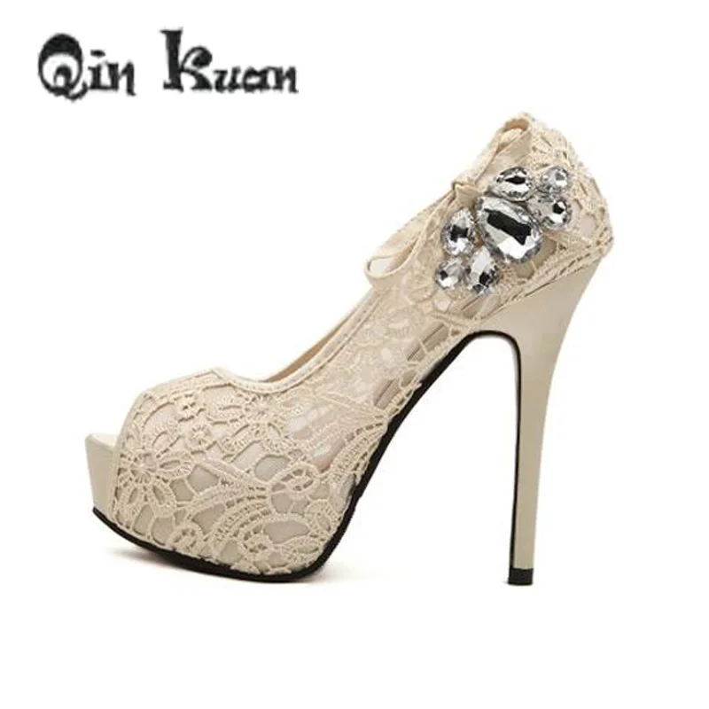 

Qin Kuan Fashion Women High Heels Pumps Shoes Ladies Peep Toe Stiletto Wedding Bridal Lace Bowtie Rhinetone Shoes Size 35-41