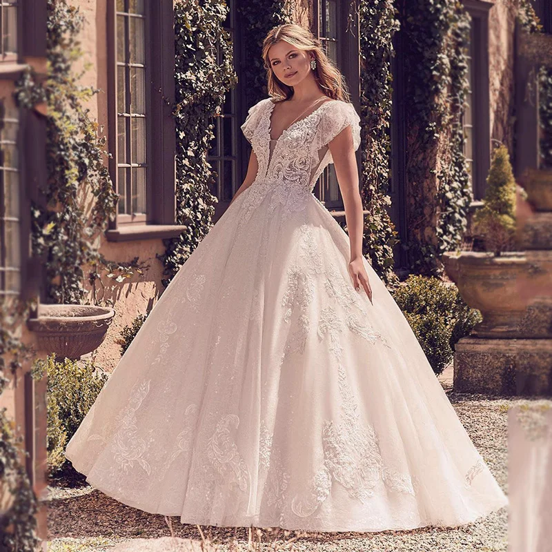 

Luxury Plunging V-neckline Ball Gown Wedding Dresses 2019 Open Back Unique Beaded Lace Appliques Layers Tulle Bridal Gowns AX142