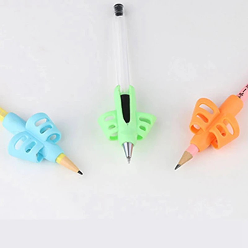 

Non-toxic Children Pencil Holder Pen Writing Aid Grip Posture Correction Tools Office School Supplies Color Random