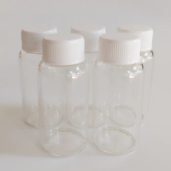 

30pcs/lot 20ml empty White plastic cap bottle Clear glass jar 27*58mm Transparent wishing bottle candy vials Home crafts