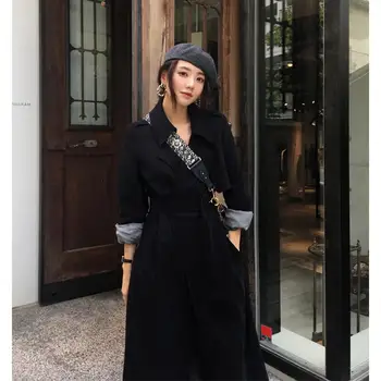 

Autumn new long black windbreaker over the knee strap Korean version of the autumn temperament wild office lady windbreaker B155