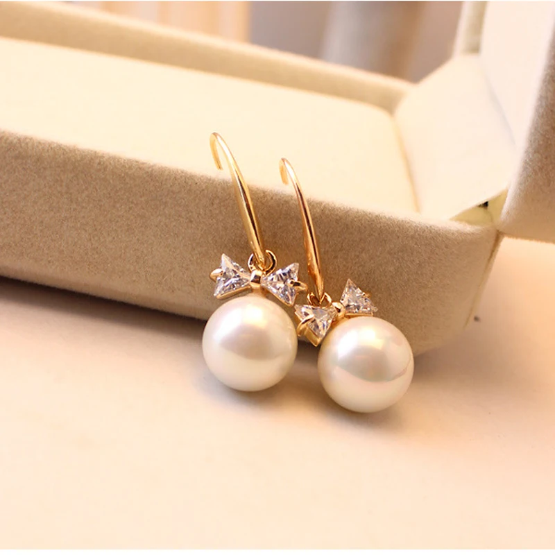 

Fashion Cute Gold-Color Alloy Bow Pattern Pearl Zircon Crystal Earrings For Women 2017 New Volunge Jewelry