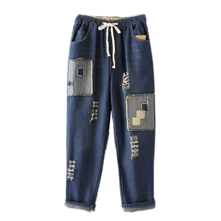 

In the spring of 2017 new European style fashion jeans all-match female lace elastic waist hole patch Haren pants