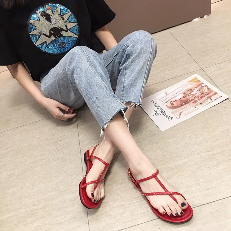 

2019 summer new style simple and simple solid color Roman style sandals women comfortable wild rivet decorative casual sandals