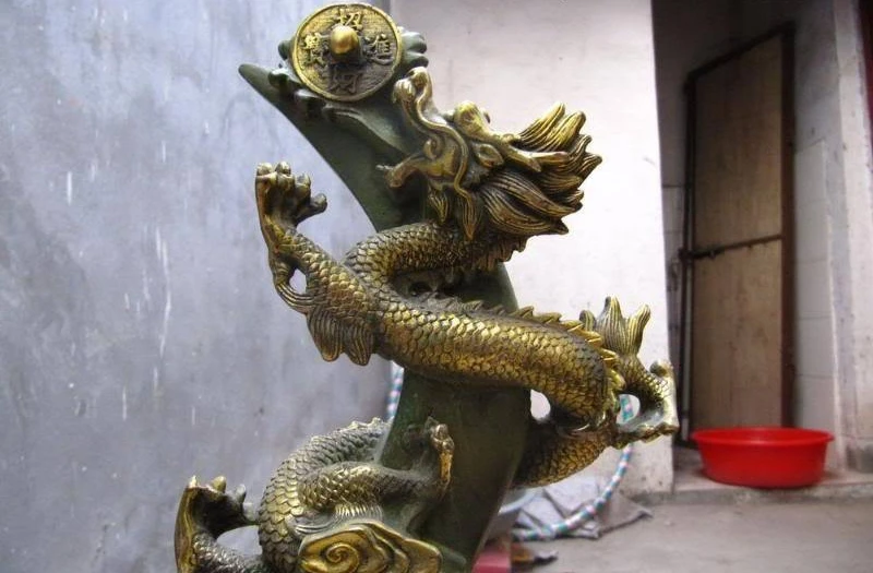 

Chinese old Bronze Carved Lucky convolve Fly Dragon play Coins Money Statue