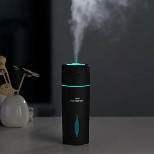 

Portable Mini Water Bottle Caps Humidifier Air Diffuser Aroma Mist w Bottle LED