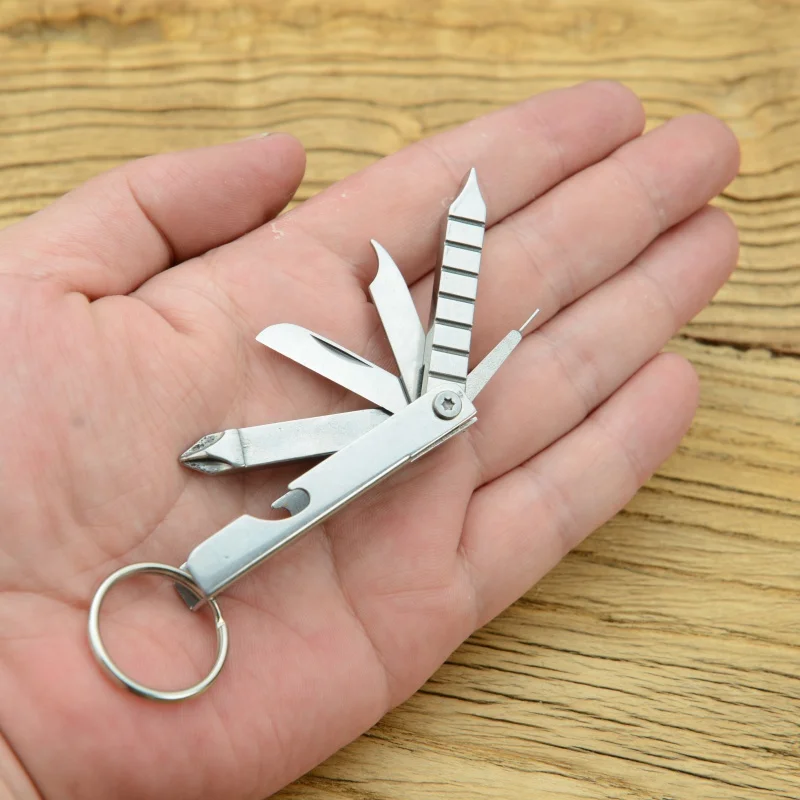 

12 In 1 EDC Pocket Tool Keychain Bottle Opener Spanner Cutter Screwdriver Nail File Multifunctional Outdoor Camping Tool