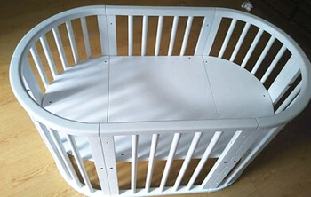 

Solid wood multi-function baby bed. No paint elliptic bed.. High-grade baby bed