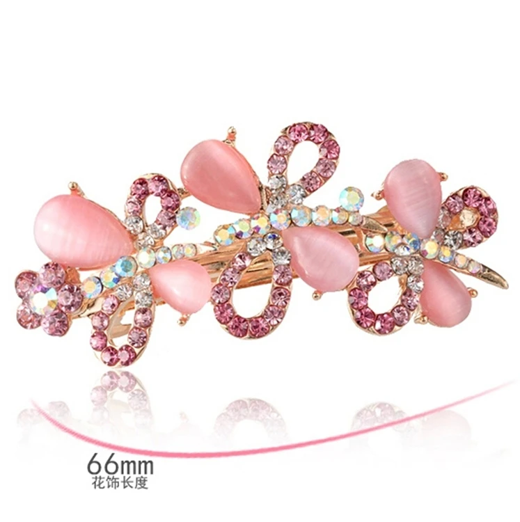 A Slim Metal Barrette Hair Clip With Pretty Pink Stones