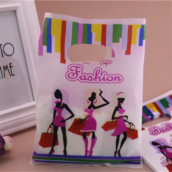 

2016 New Design Wholesale 100pcs/lot 20*25cm Fashion Women Plastic Shopping Bags With Handle Clothing Packaging Bags