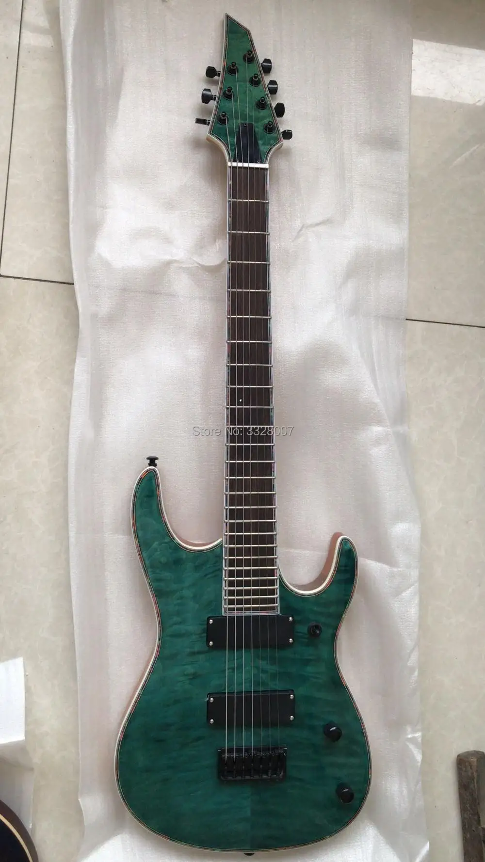 

custom shop.7 strings guitar in green color;quilted maple top;free shipping
