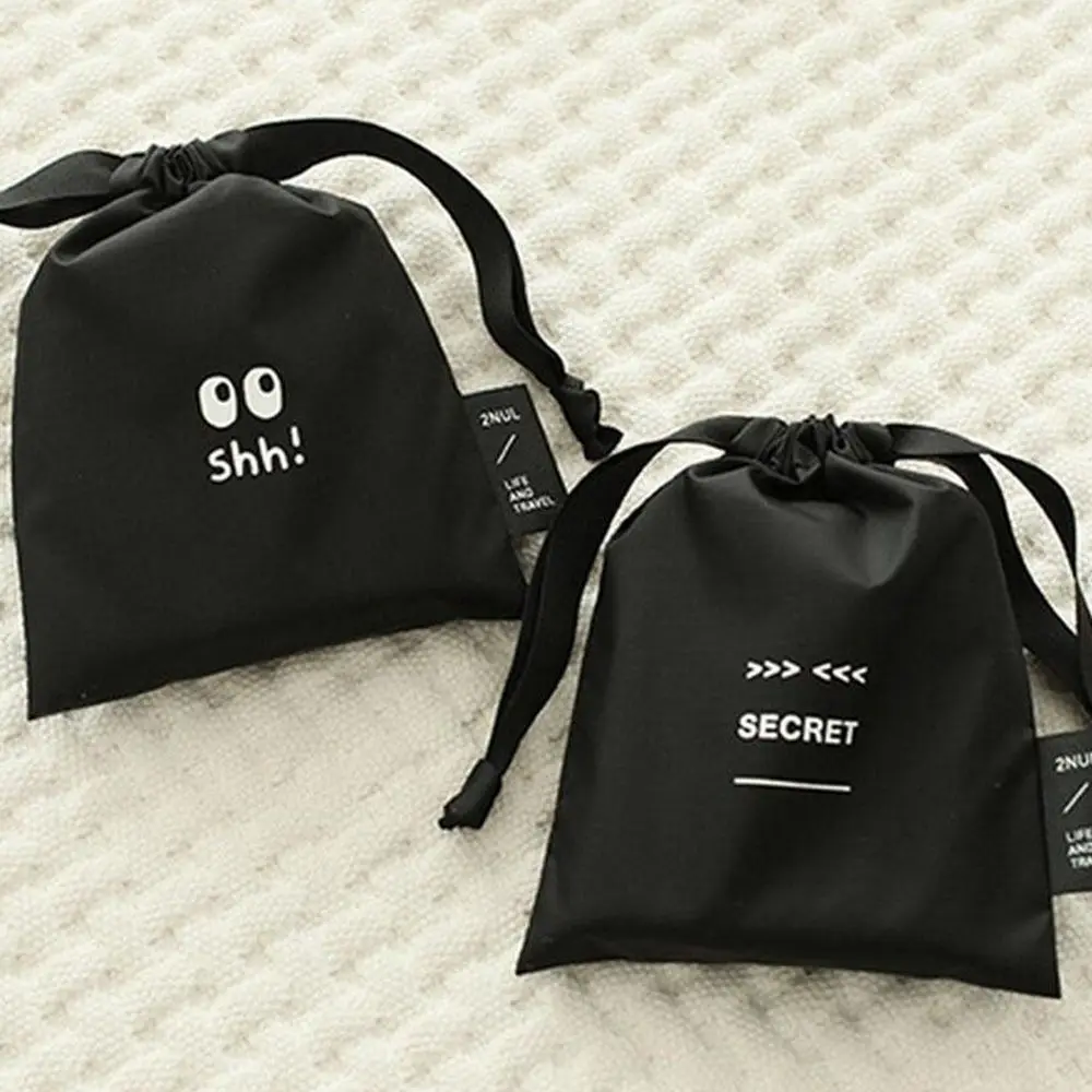 

Hot sale New Drawstring Travel Storage Bag Black Portable Cute Sanitary Napkin Organizer Pouch Case Nylon Cosmetic Makeup Bag