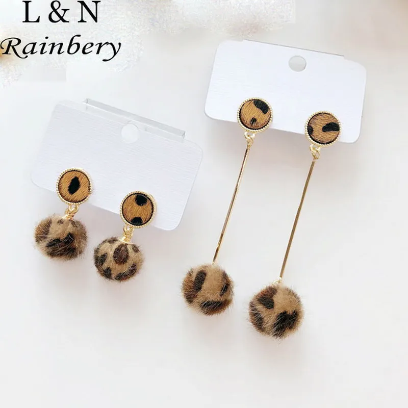 

Rainbery Personality Leopard Print Pom Pom Earrings Cute Colorful Fur Ball Pendant Dangle Earrings For Women JE0635