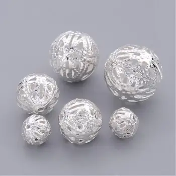 

Iron Filigree Beads, Silver Color, about 6-16mm in diameter, 6-15mm thick, hole: 1-6mm, about 200g/bag