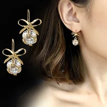 European and American fashion long bow copper material women's ear nail party earrings