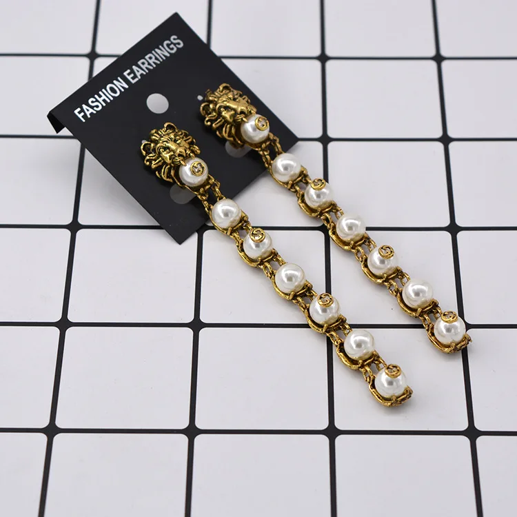 

Fashion long domineering freshwater pearl lion head retro earrings