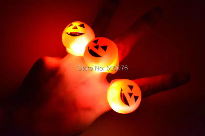 

Free shipping 1152pcs/lot Fun Party Favors Flashing pumpkin Party Finger Rings LED Light up Dark Halloween Party Supplies Gift