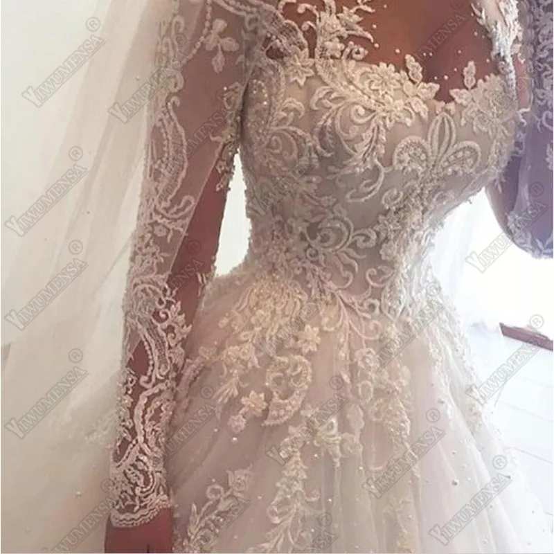

Arabic Dubai Ball Gown Wedding Dresses Formal Party Women Marriage Full Sleeves Crystals Beads Appliques Ivory Bridal Gowns 2023