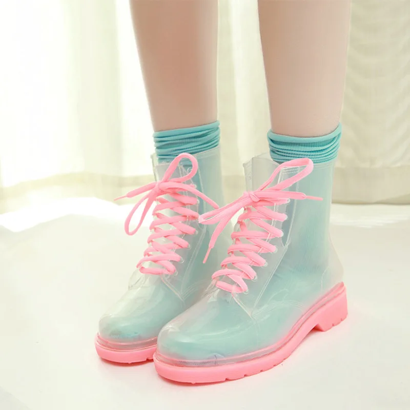 

Korean version of the new crystal jelly shoes candy color flat Martin boots fashion perspective transparent wild water shoes.