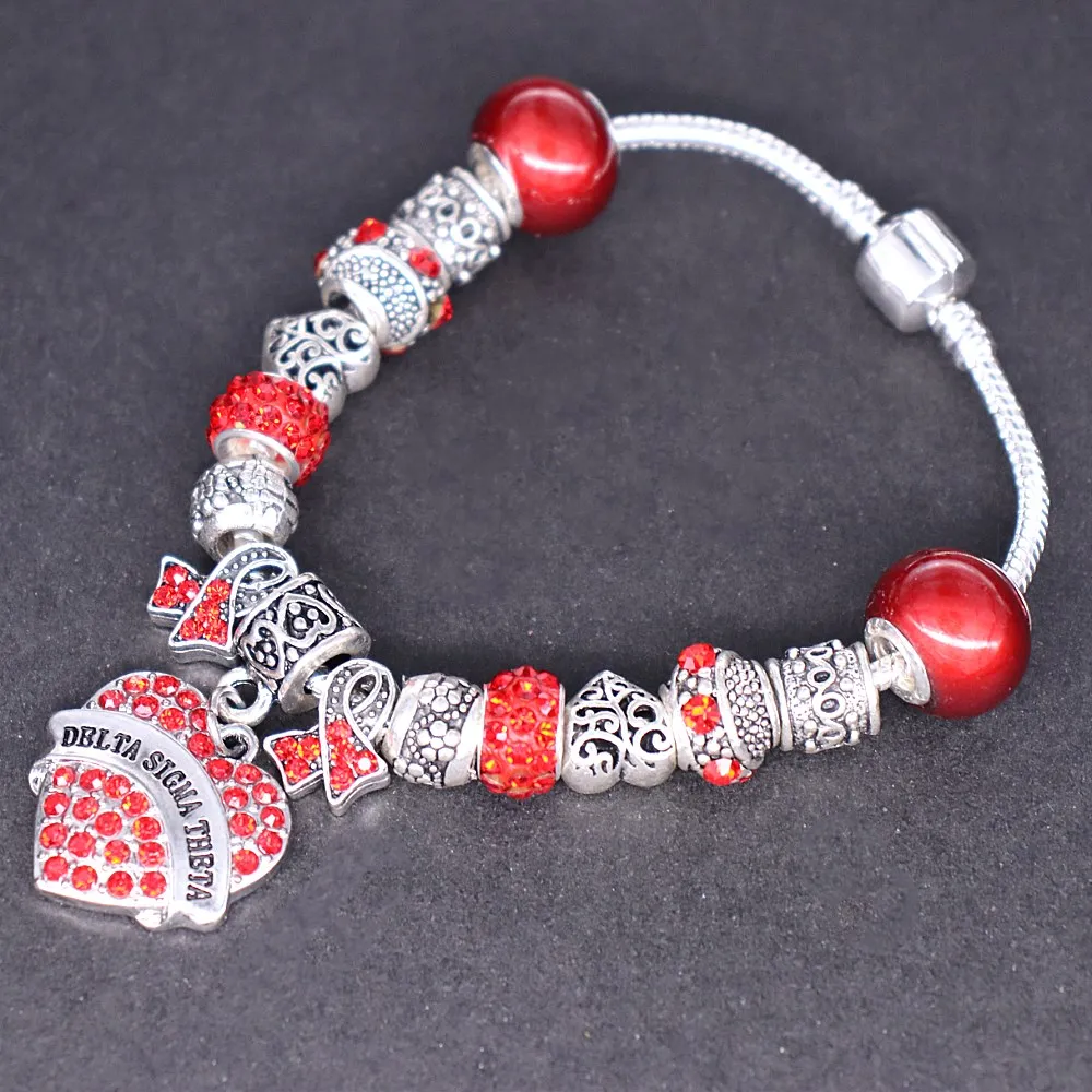 

Double Nose Heart Engraved Delta Sigma Theta DST Greek Letter Sorority European Bracelets With Red Crystal Bead For College Gift