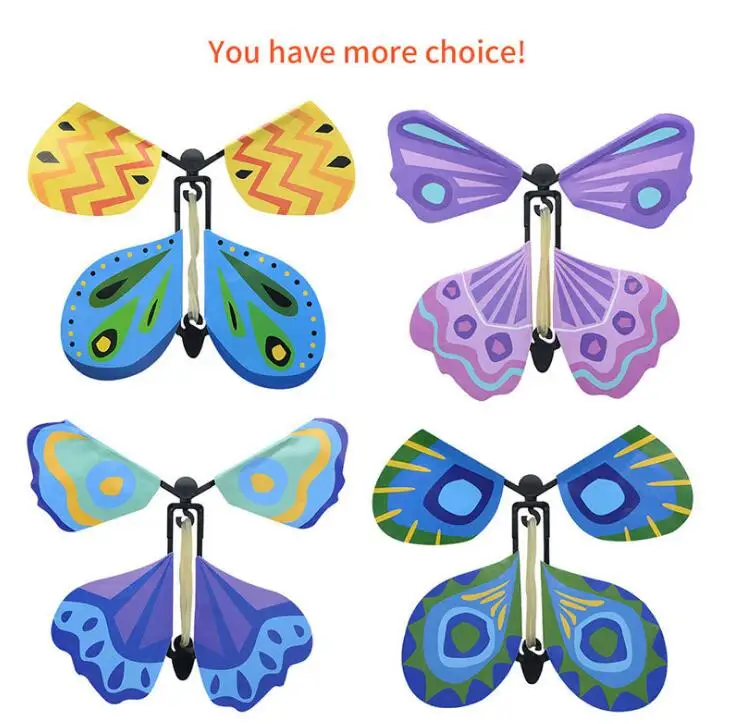 

Magic Plastic Flying Butterfly Card Toys In the Book Rubber Band Powered Easy Magic Tricks Props for Children Gift Free Shipping
