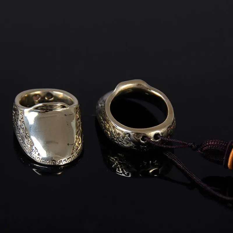 Günstige 16 23mm Finger Schutz Messing Schießen Ring Katapult Sport Finger Schutz Getriebe Traditionellen Daumen für Outdoor Jagd Schießen