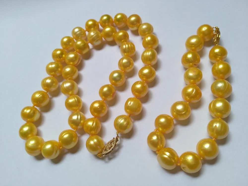 

Free Shipping >>>>>HUGE NATURAL AAA 11-12MM SOUTH SEA GOLD PEARL NECKLACE + BRACELET14K GOLD CLASP