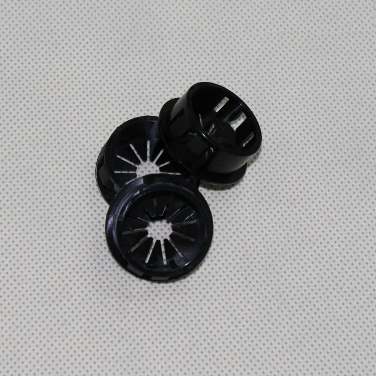 

plastic button protector coils out of the coil loop plug wire protection sleeve.