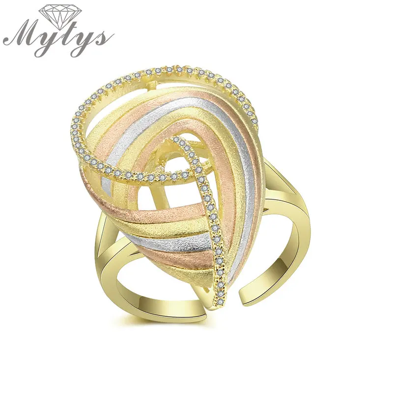 

Mytys Fashion Ring Oval Geometric Cross Mix Gold Statement Ring for Women AAA Zircon Sand Blast Brass Excellent Craftwork R2051