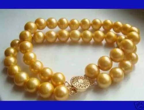 

xiuli 00601 2 row 8mm Golden shell pearl bracelet 14KGPGP Clasp