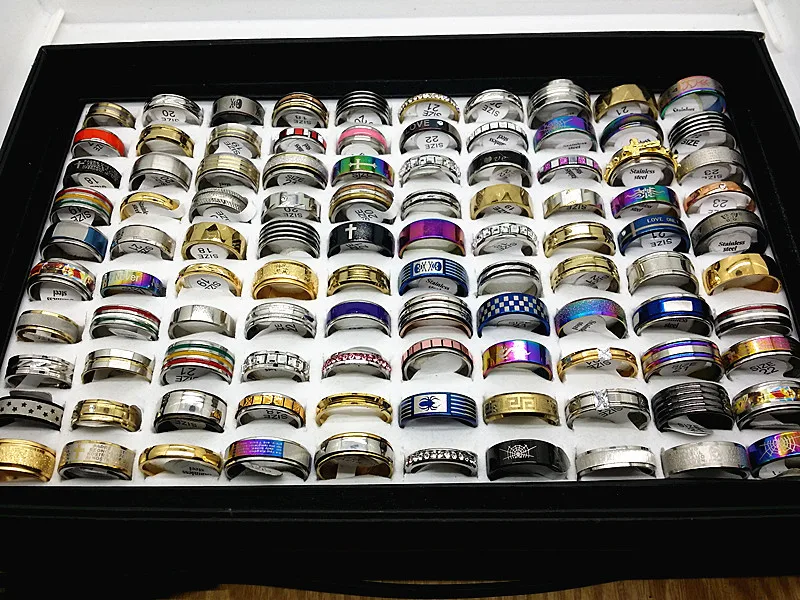 

wholesale 100pcs/box mix styles stainless steel jewelry rings with a display tray brand new
