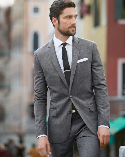 grey coat and tie