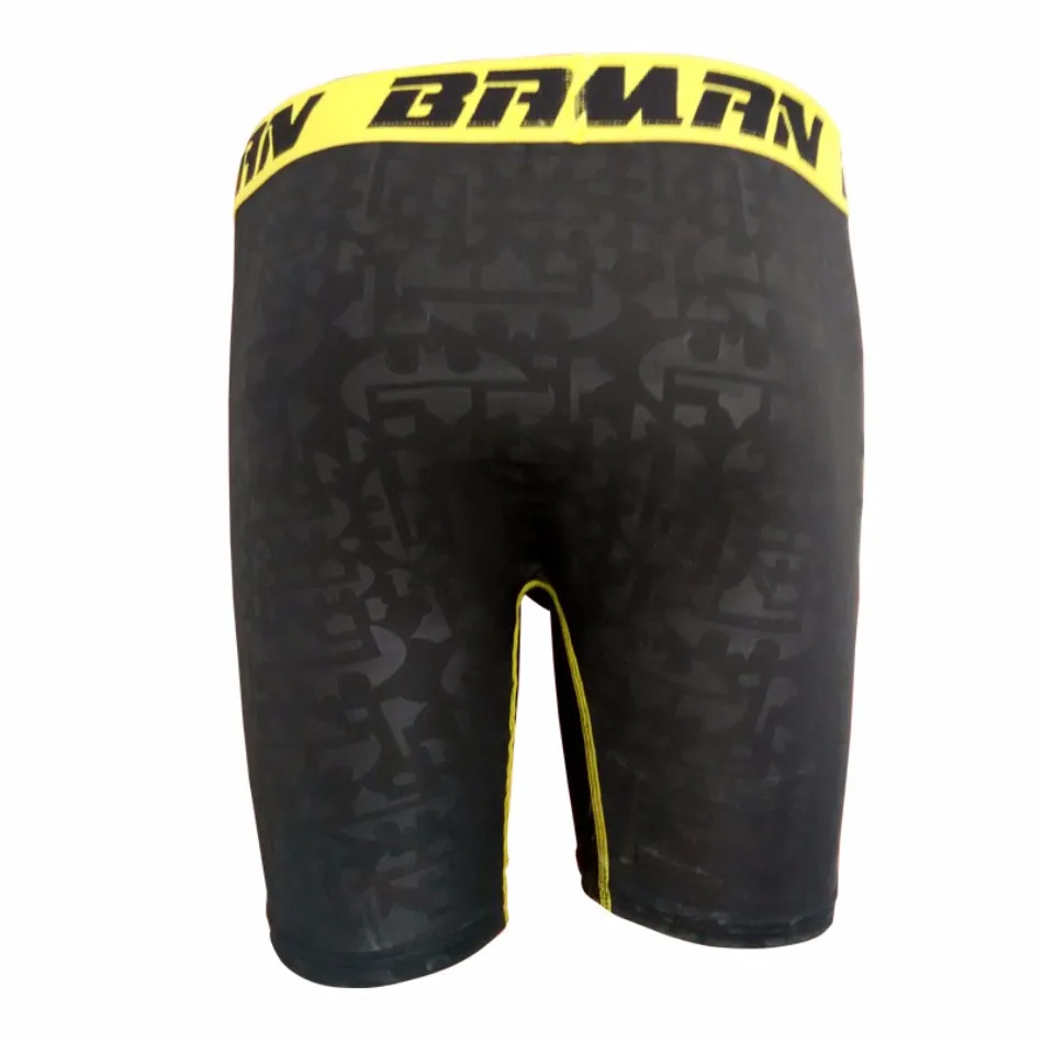 Liibuvad meeste spordipüksid Batmani logoga Liibuvad meeste spordipüksid Batmani logoga