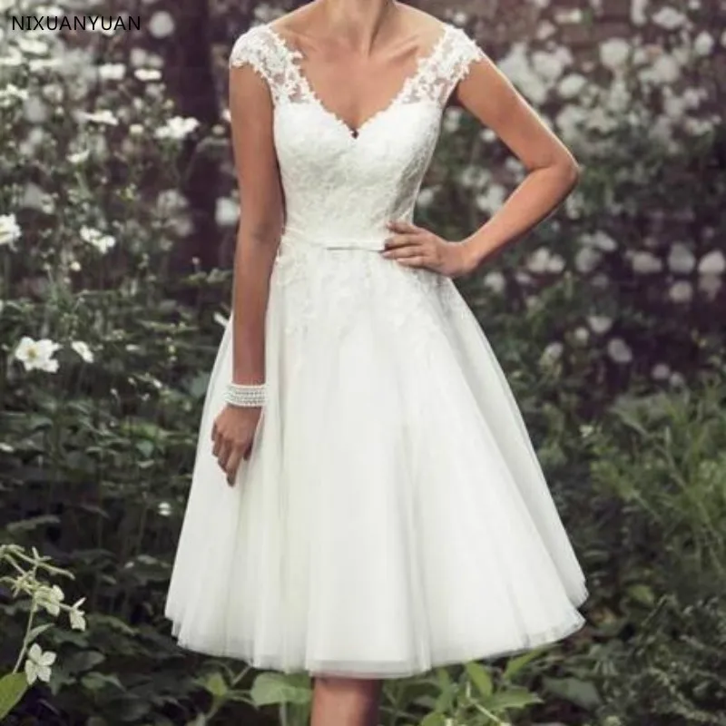 Strand Elegante Thee Lengte Korte Trouwjurken Lace Kapmouwtjes Applicaties Bruidsjurken Tulle V-hals Vestido De Noiva Strand Elegante Thee Lengte Korte Trouwjurken Lace Kapmouwtjes Applicaties Bruidsjurken Tulle V-hals Vestido De Noiva