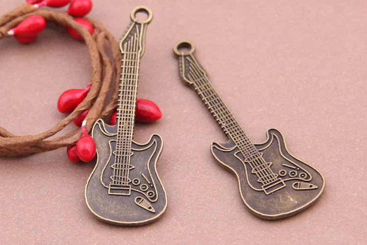 

50pcs Vintage Guitar Charm Fit Manual Making Jewelry Earrings/Bracelets/necklace/key Chain Fashion DIY Jewelry Accessories