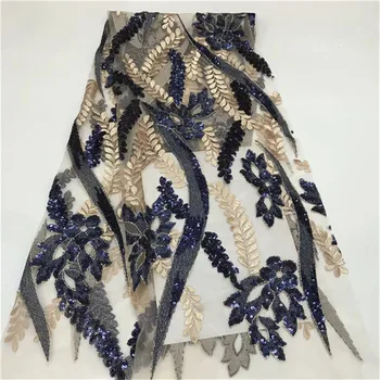 

In 2018 (5 yards/PC) high quality royal blue Africa hand-cut organza lace fabric with sequins for large party dresses.