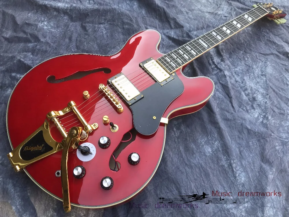 

China OEM firehawk shop electric guitar G hollow jazz guitar Big jazz vibrato system Gold hardware Multi-position switch