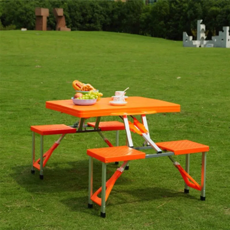 

Multi-function folding picnic table and chair orange ABS Convenient to carry Set of Table and 4 Chairs Indoor & Outdoor