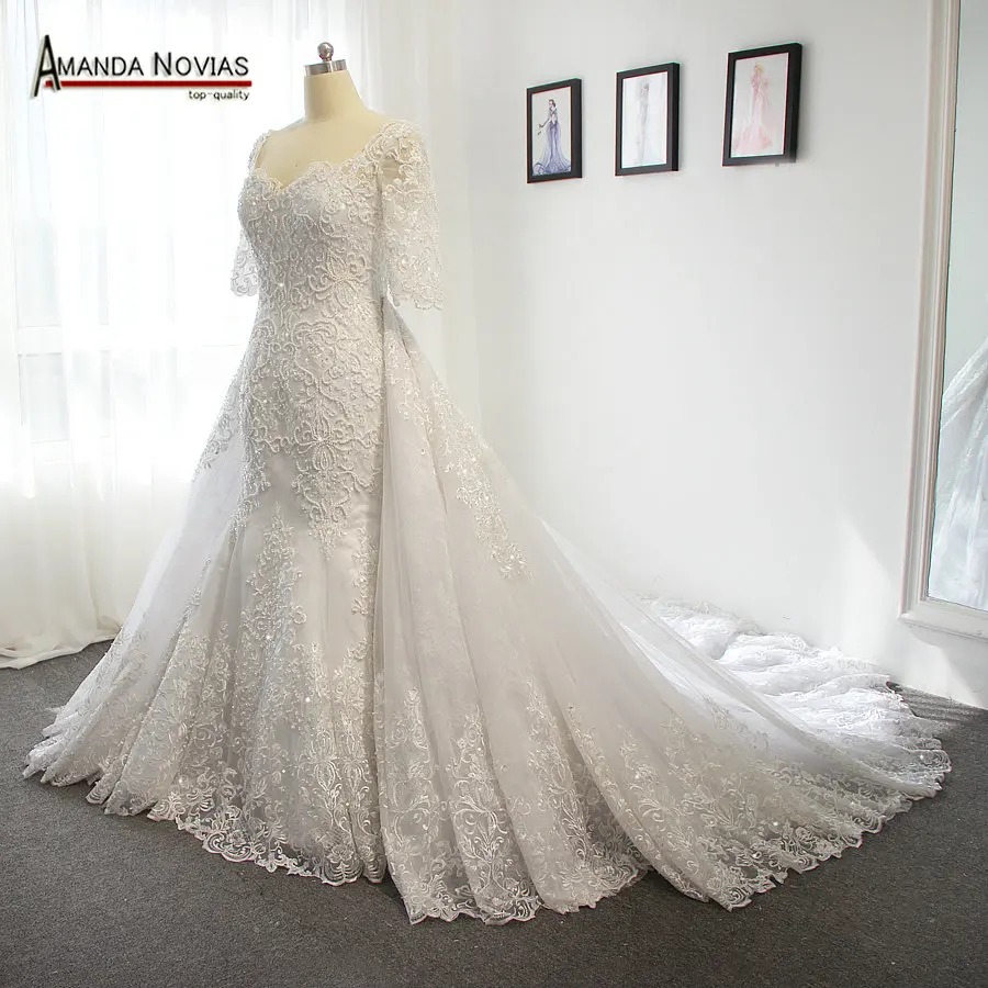 

2017 Luxury full heavy beading pearls wedding dress with a long detachable train