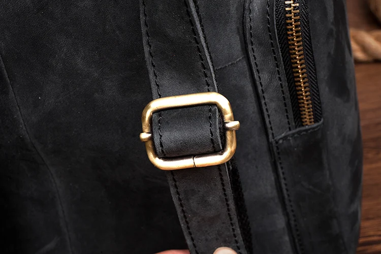 Black Leather Backpack Handstrap Detail