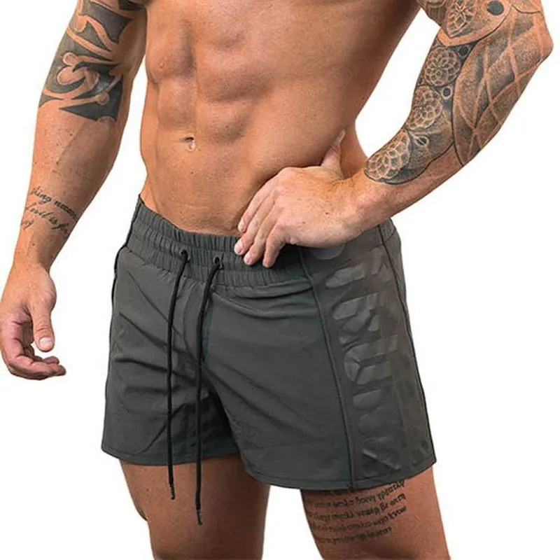 

2019 new summer sports shorts men's fitness shorts training bodybuilding running shorts thin section quick-drying beach shorts