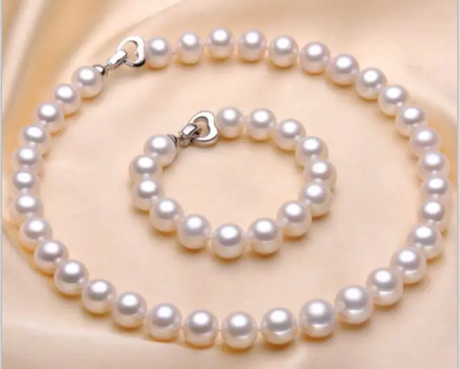 

a set of 10-11mm natural south sea white pearl necklace bracelet silver clasp